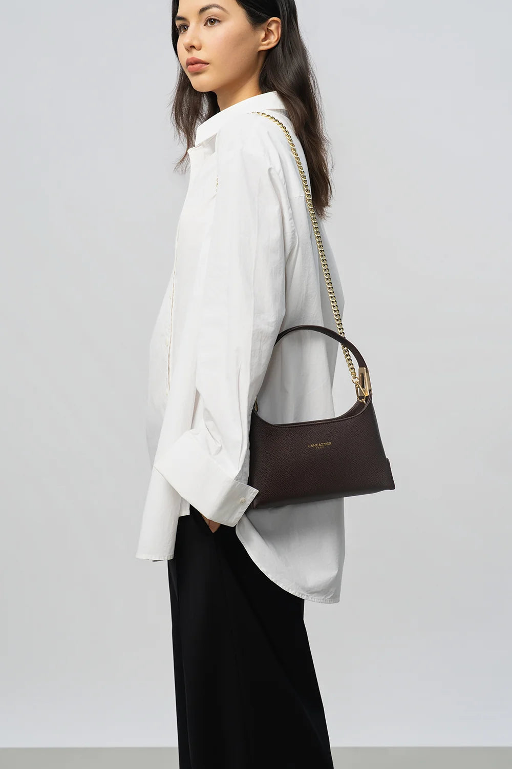 Sac à main en cuir bordeaux et bandoulière chaine dorée Lancaster Lyche Ace 422-038